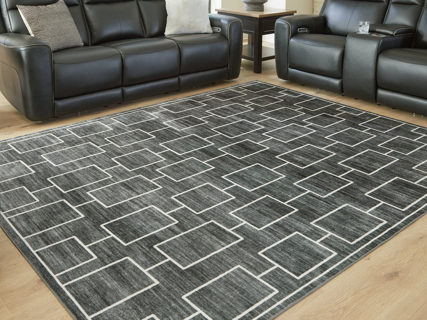 Cape Furniture Outlet - Ashley Furniture - Elderland Rug - Washable 7'6" x 9'6" Area Rug / Black/Gray - R407401