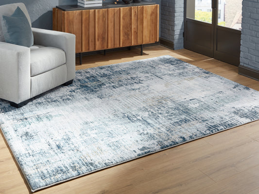 Cape Furniture Outlet - Ashley Furniture - Arlenmont Rug - 5' x 7' Area Rug / Blue/White/Brown - R407482