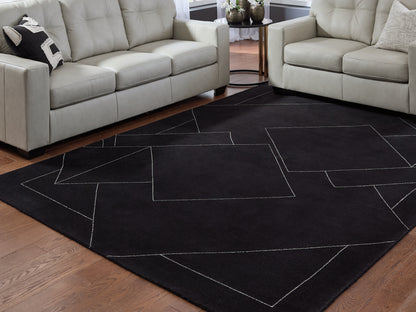 Cape Furniture Outlet - Ashley Furniture - Marav Rug - 7'8" x 10' Area Rug / Black/White - R407531
