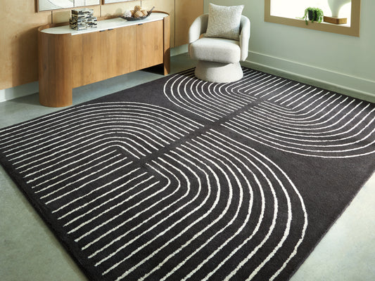 Cape Furniture Outlet - Ashley Furniture - Eldonmore Rug - 7'8" x 10' Area Rug / Black/Ivory - R407571