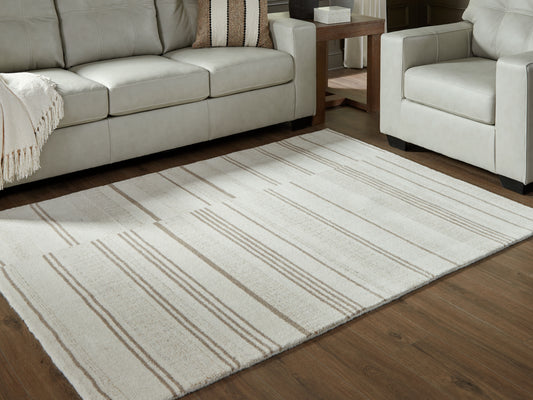 Cape Furniture Outlet - Ashley Furniture - Gadence Rug - 5' x 7' Area Rug / Ivory/Tan - R407642