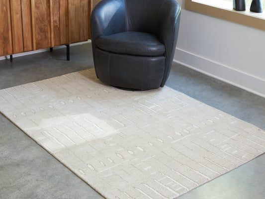 Cape Furniture Outlet - Ashley Furniture - Wolbert Rug - 7'8" x 10' Area Rug / Tan/Ivory - R407661