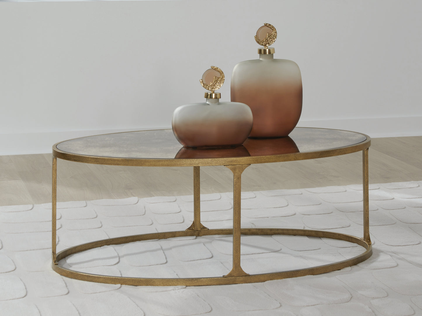 Cape Furniture Outlet - Ashley Furniture - Korajane Coffee Table - Oval Cocktail Table / Antique Gold - T399-0