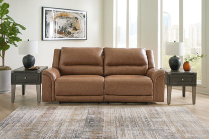 Cape Furniture Outlet - Ashley Furniture - Trasimeno Living Room - 2 Seat PWR REC Sofa ADJ HDREST / Caramel - U8281547