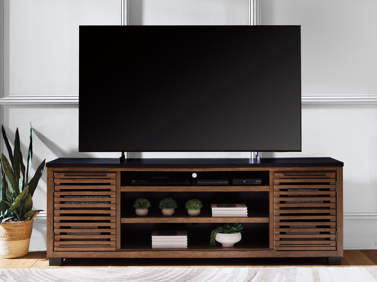 Cape Furniture Outlet - Ashley Furniture - Kallari 84" TV Stand - 84" / Warm Brown/Black - W737-78